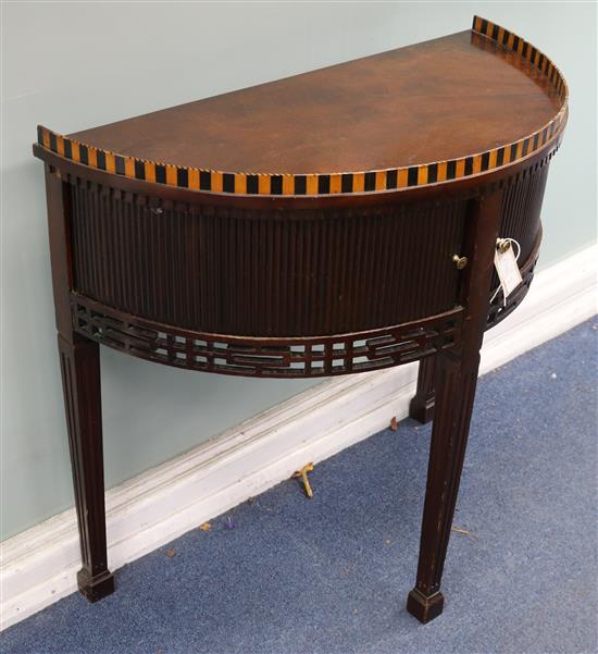 A 19th century mahogany Dutch demi lune cabinet W.77cm